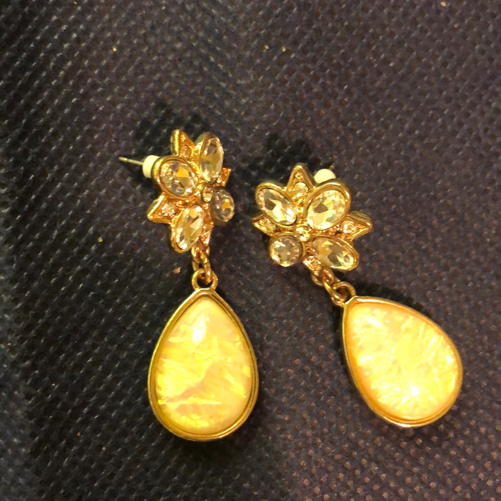 Gold tone earrings with rhinestone